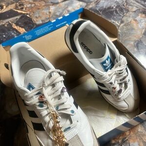 adidas White Sneakers with Black Stripes and Blue Logo